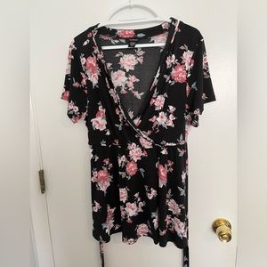 Torrid black and floral wrap top. Size 1